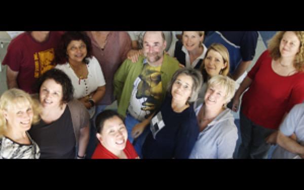 Aged-care board members reviewing a strategic plan